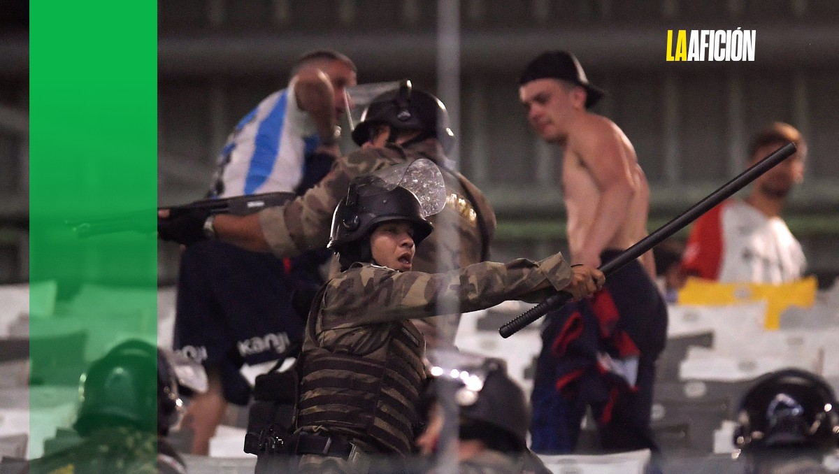 Aficionados de San Lorenzo son golpeados por policía brasileña en partido de Copa Libertadores (AFP)