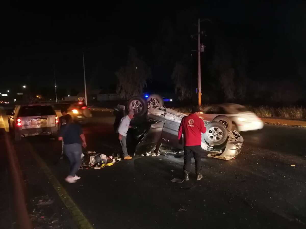 Volcadura en periférico.