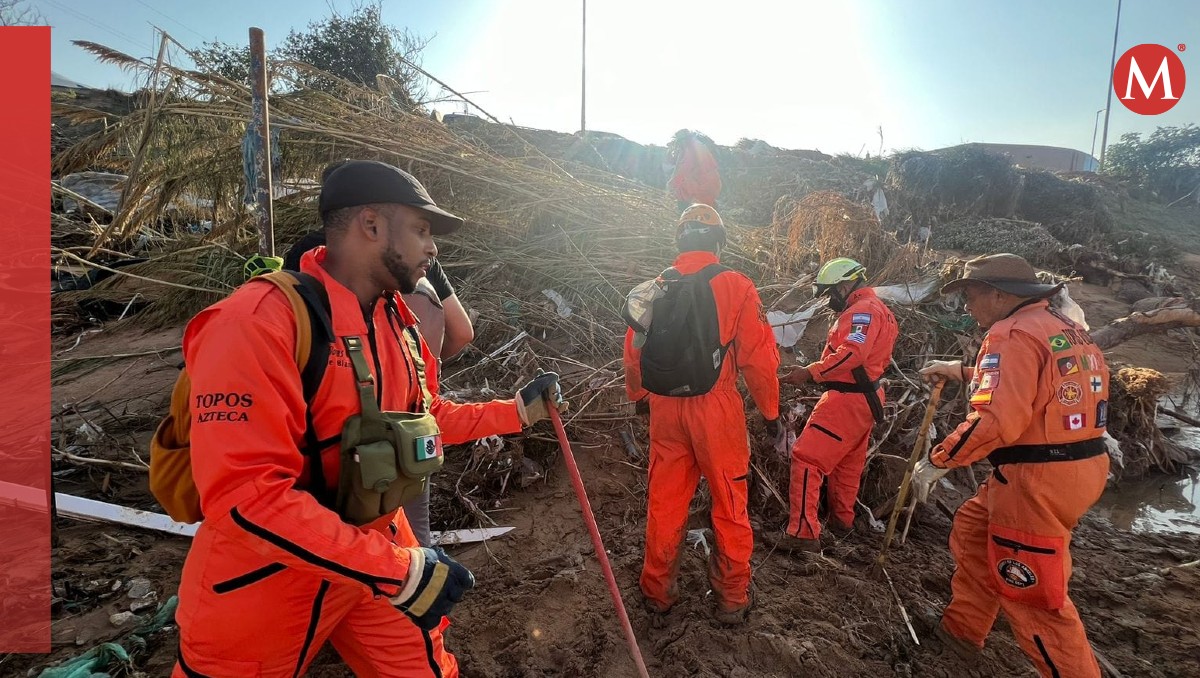 Brigada de rescate, Topos Azteca apoyan con trabajos de rescate en Valencia, España | Especial