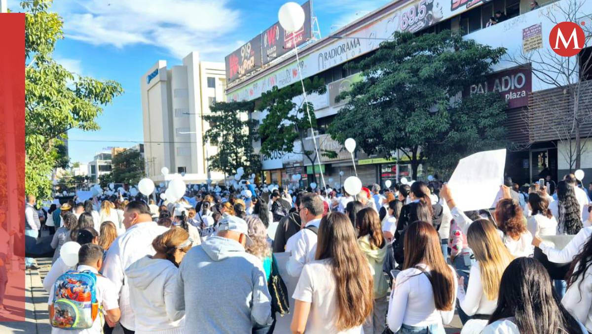 Habitantes de Culiacán participan en la marcha por el homicidio de Alexander y Gael.