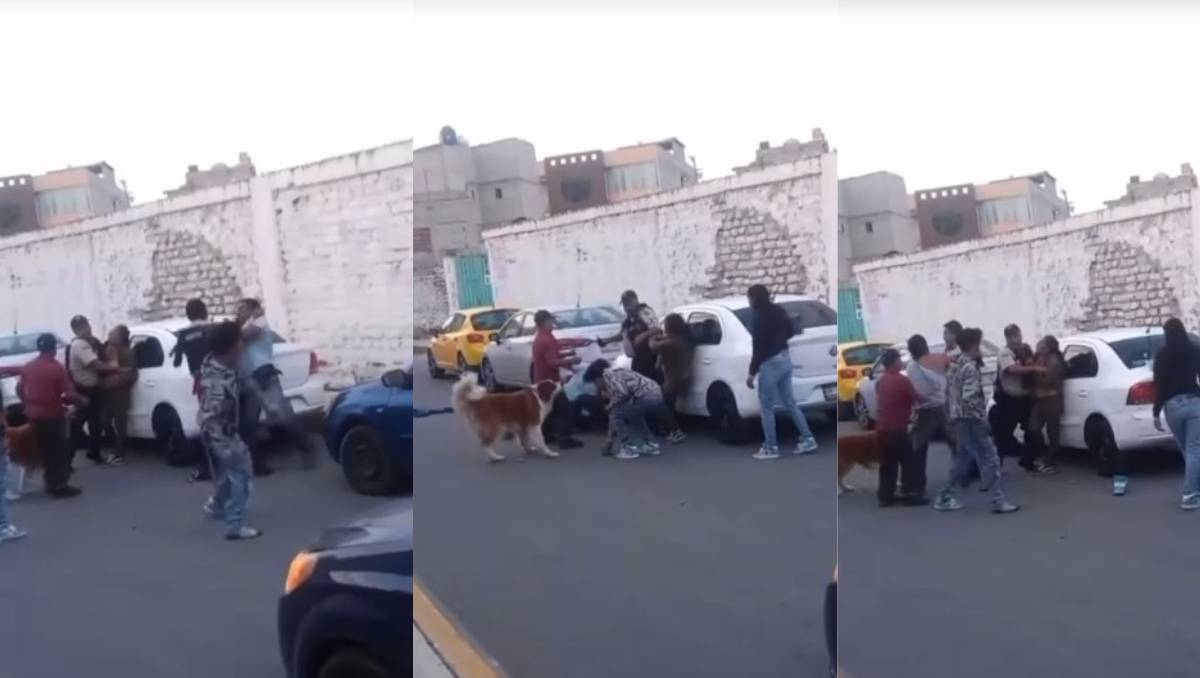 En las imágenes se observa como oficiales intentan detener a uno de los sujetos, cuando un segundo agresor va contra uno de los policías. | Especial