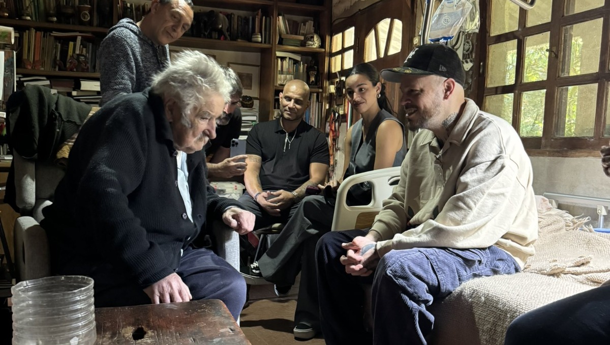 Residente en una foto junto a José Mujica