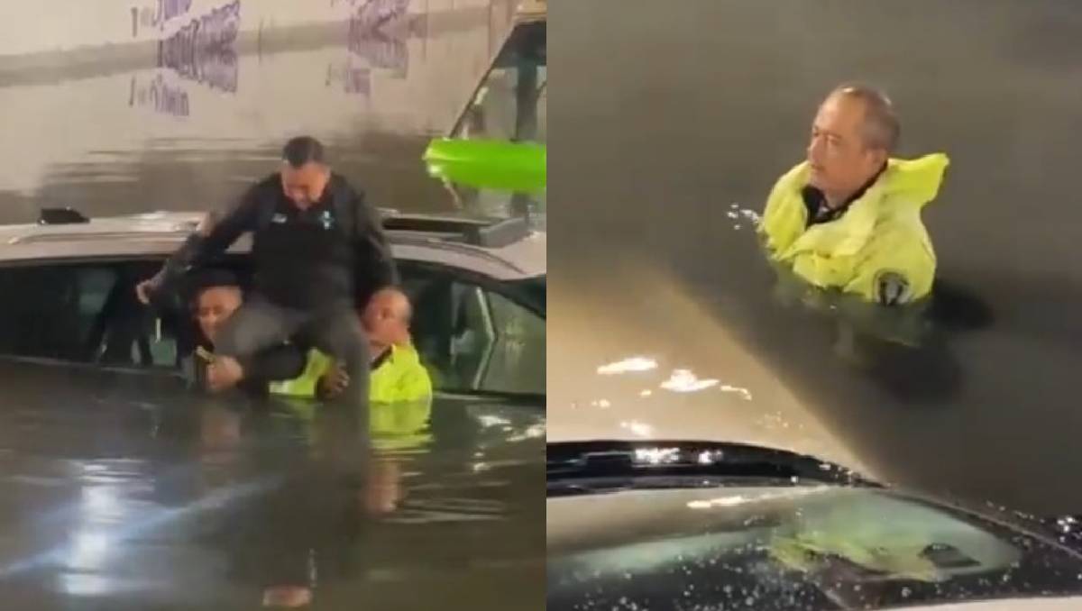 Oficial ayuda en inundaciones en CdMx