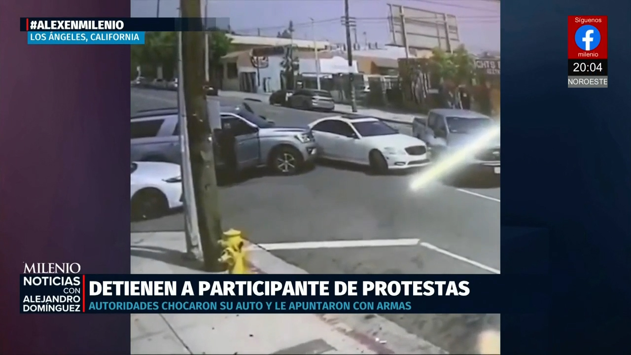 Migrante detenido con violencia en protesta es acusado de agredir a un policía