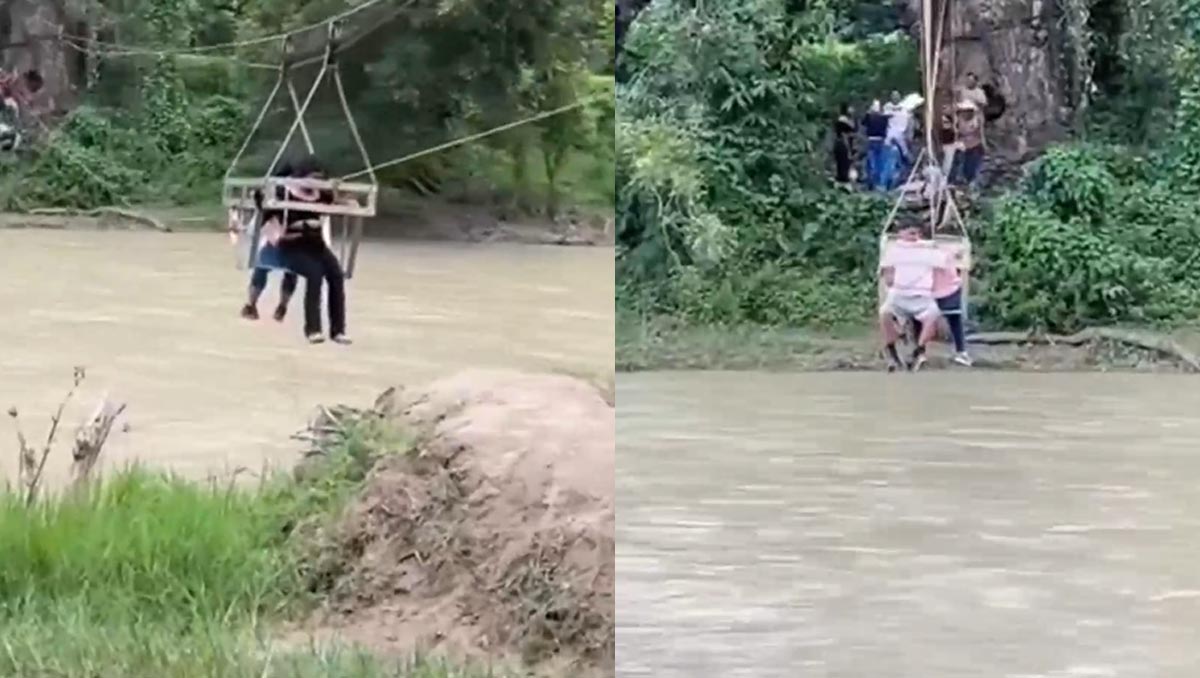 A falta de puente, cruzan el río Amajac en Hidalgo a bordo de canastilla suspendida