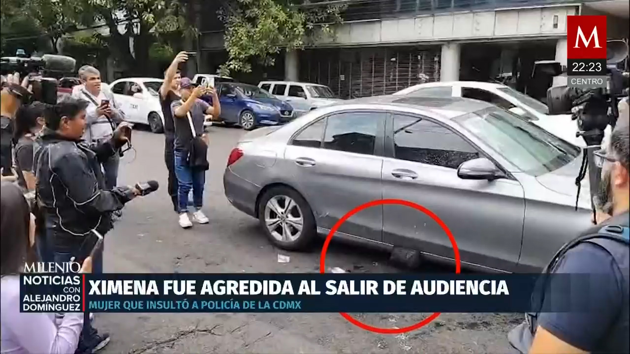 Le roban la bolsa a 'Lady Racista' tras salir de audiencia; policía la recupera