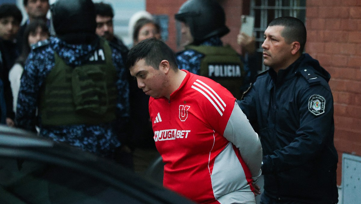 Liberan a aficionados de la U de Chile tras brutal riña en estadio de Independiente  (AFP)