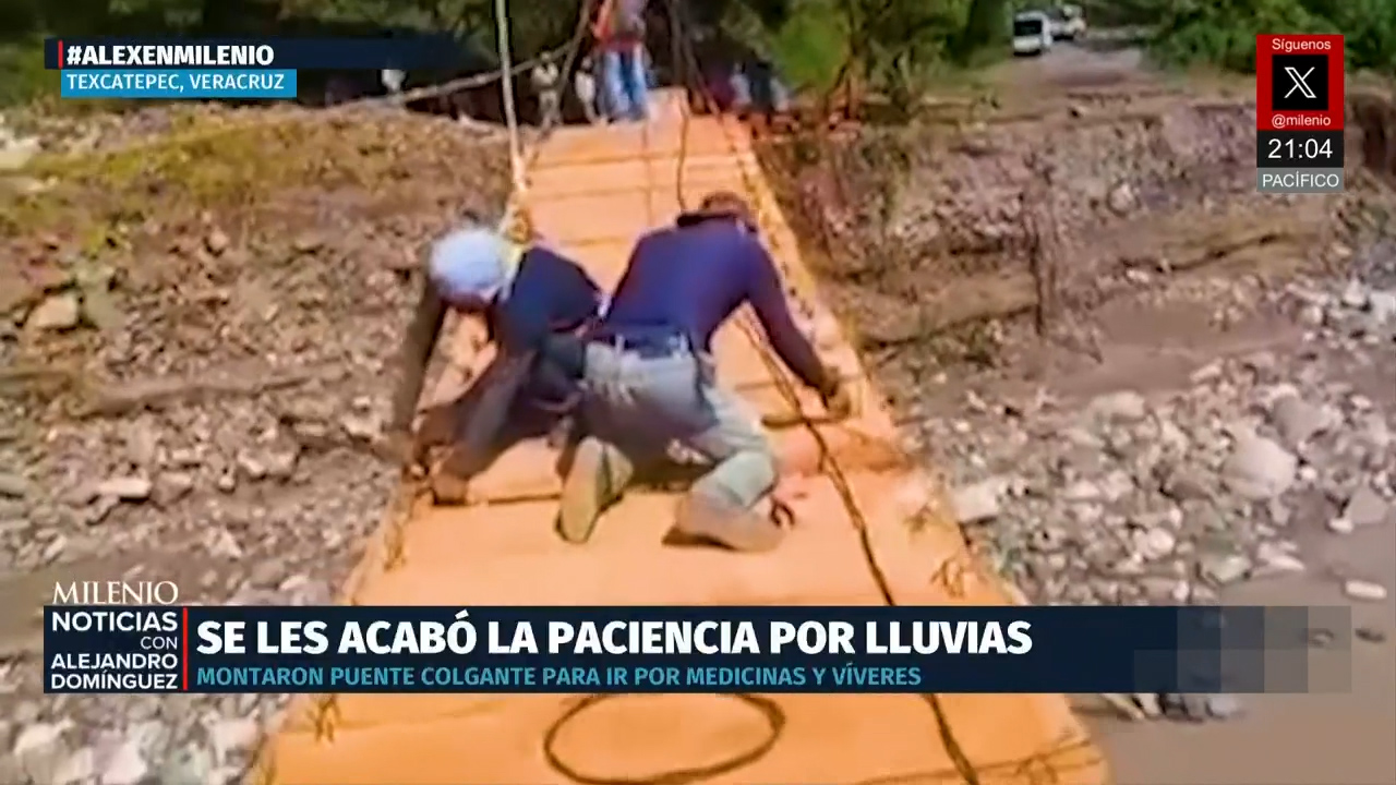 Habitantes de la Huasteca colocan puente colgante tras inundaciones en Veracruz