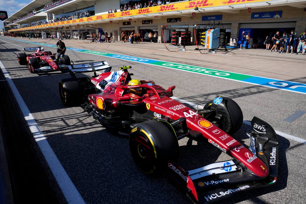 Lewis Hamilton y Charles Leclerc en el pit lane del Gran Premio de Estados Unidos (Reuters)