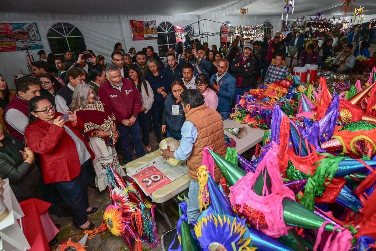 Asistentes disfrutando de la Expo Navidad Forestal Edoméx 2025 en Metepec. | Especial