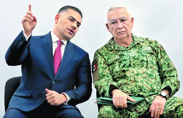 Los titulares de SSPC y de la Defensa Nacional en conferencia de prensa. Cuartoscuro