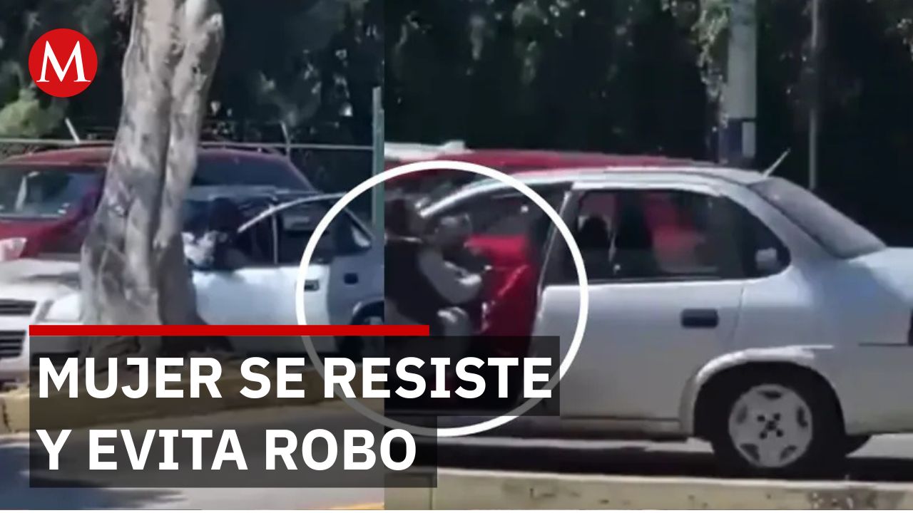 Mujer se cuelga de su vehículo y evita robo a plena luz del día en Puebla
