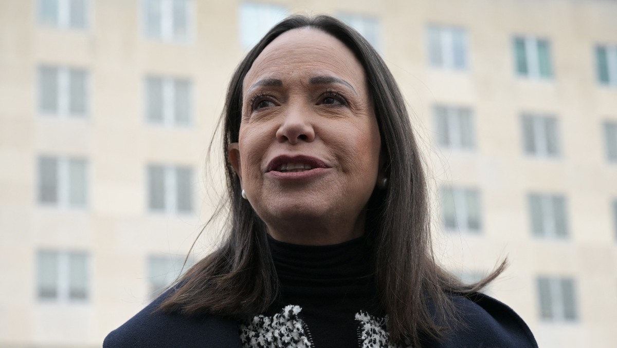 Machado dijo estar dispuesta a compartir el gobierno de Venezuela con Delcy Rodríguez. | AFP