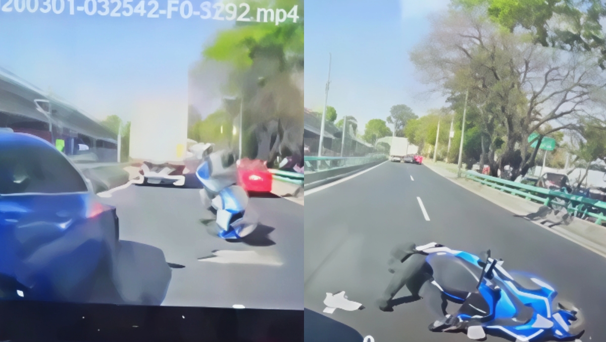 La moto quedó encima del conductor tras reparar a causa del bache. | Especial