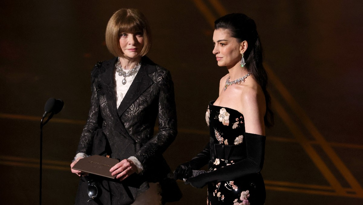 Anne Hathaway y Anna Wintour | AFP