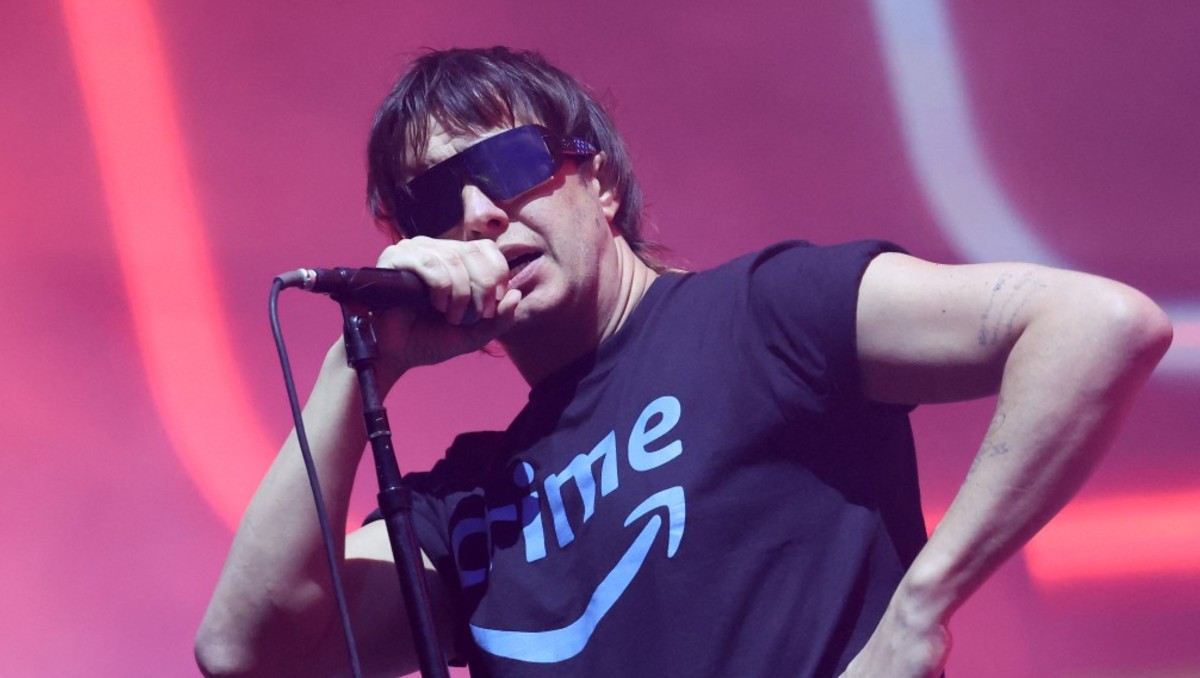 El vocalista de la banda se pronunció sobre el show de Bieber. | AFP