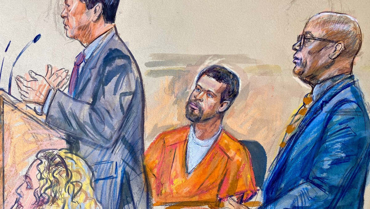 Cole Tomas Allen escuchando mientras su abogado Eugene Ohm. | AP