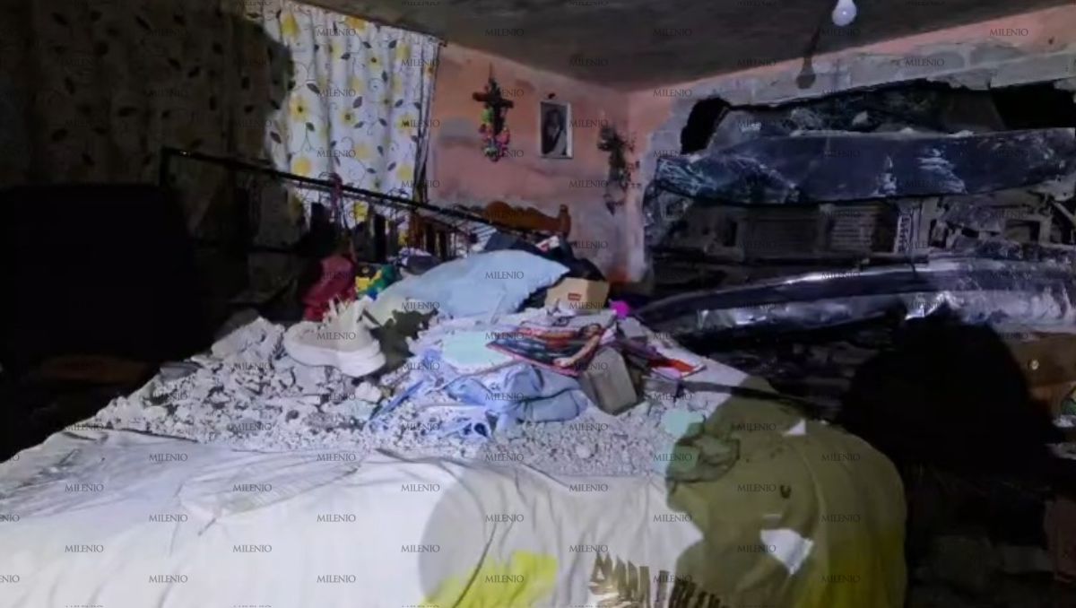 Una camioneta terminó incrustada en una vivida en el enfrentamiento en Ocuilan. | Foto: Especial