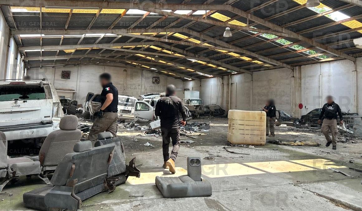 Hallan 15 vehículos blindados en bodega clandestina en Reynosa