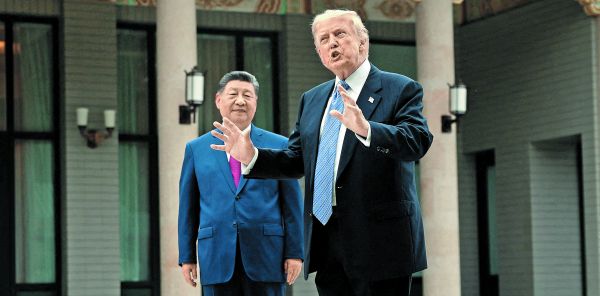 Los mandatarios chino y estadunidenses conversaron en Pe- kín. MARK SCHIEFELBEIN/REUTERS