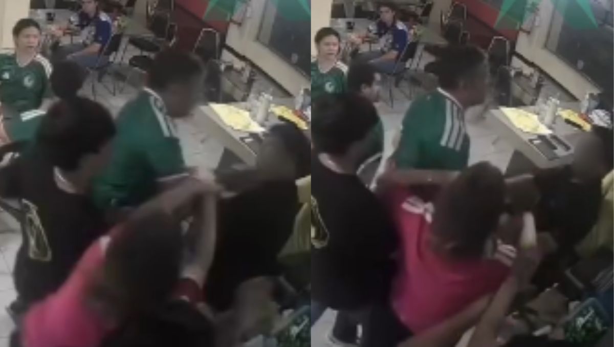El alcalde se acerca al trabajador e intenta sujetarlo del cuello | Especial