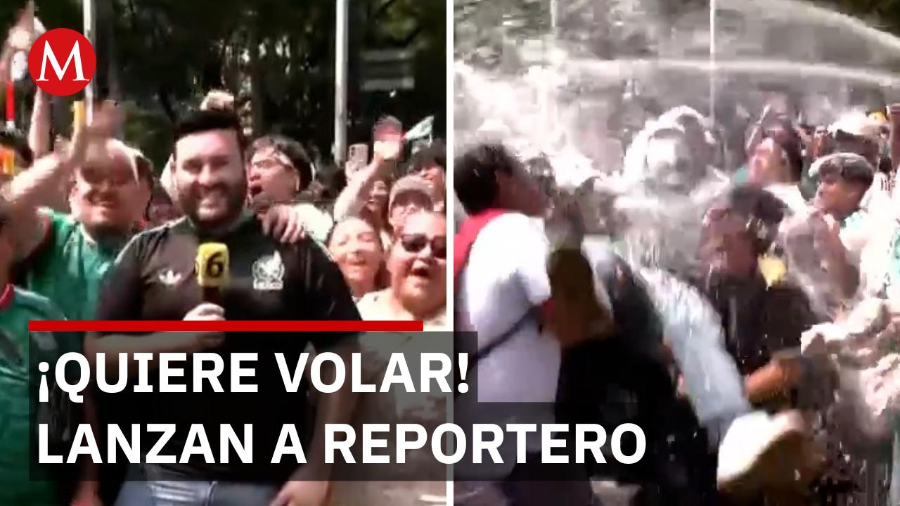 ¡Quiere volar!: Aficionados lanzan a reportero de Milenio en plena transmisión