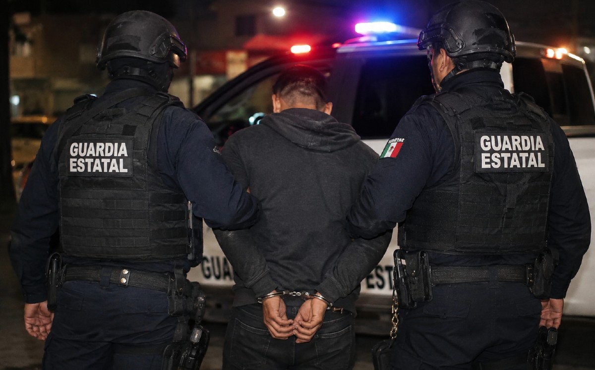 Ataque entre Guardia Estatal y civiles armados. | ia