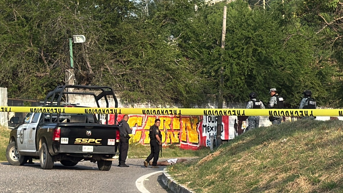 Efectivos de la Guardia Nacional acordonan el área tras el reporte de detonaciones de arma de fuego.| Foto: Especial