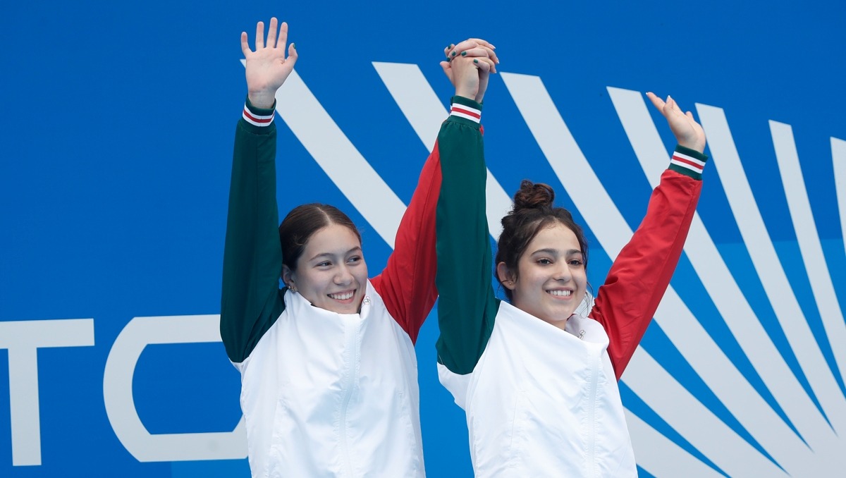 Rut Páez y Yunuen Parra celebran su participación en la prueba individual de trampolín de un metro en Santo Domingo 2026. (Agencia EFE)