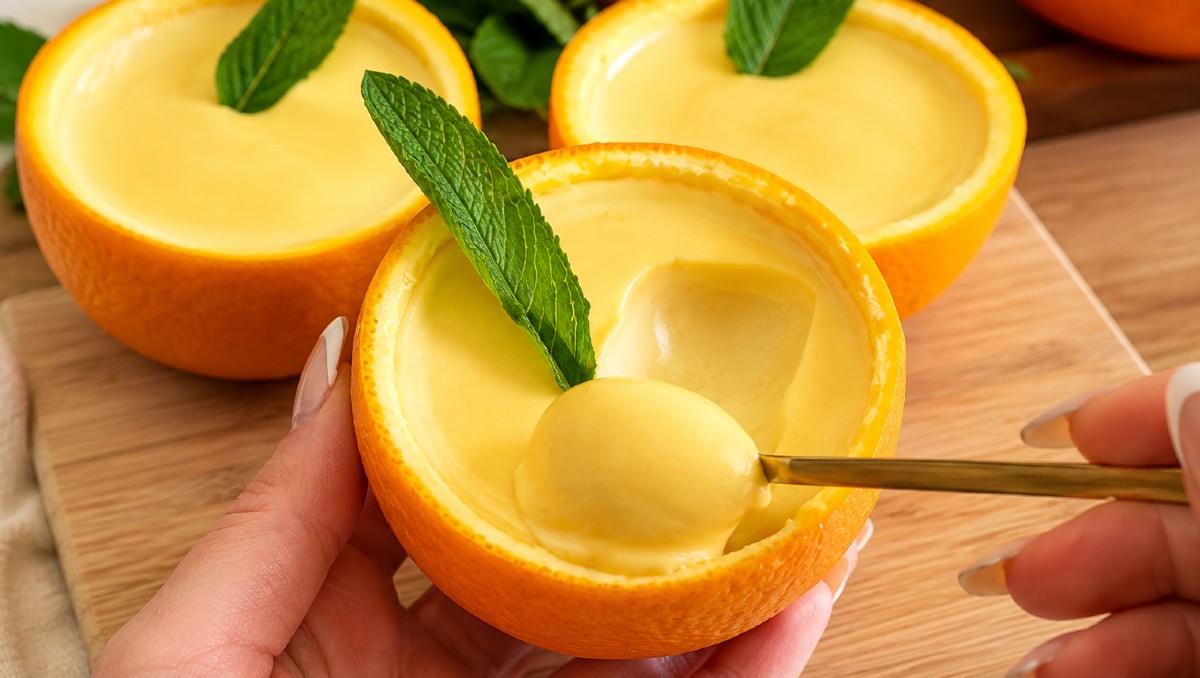 Postre de naranja con una preparación deliciosa y un acabado cremoso | IA DISCOVER