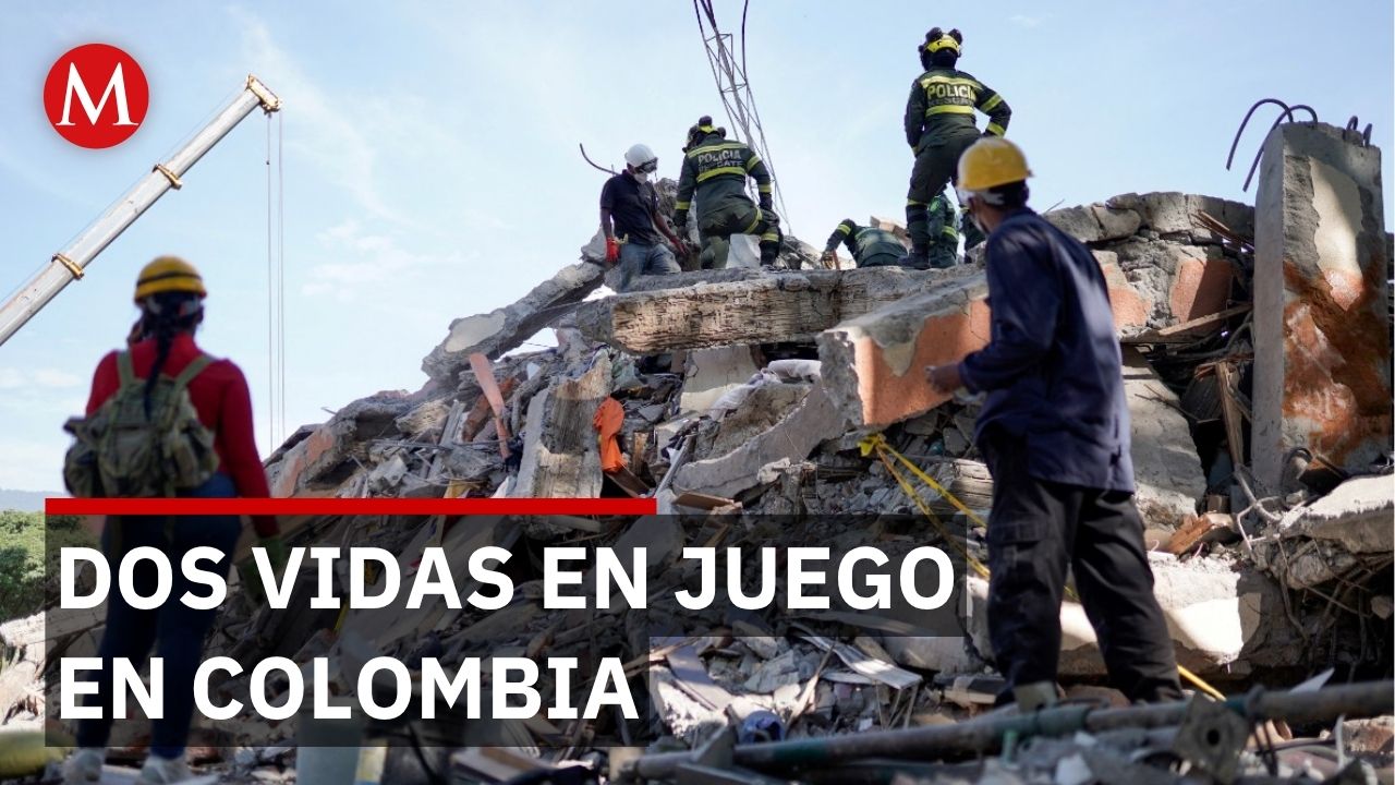 Esperan rescate de dos personas bajo escombros de un edificio en Colombia