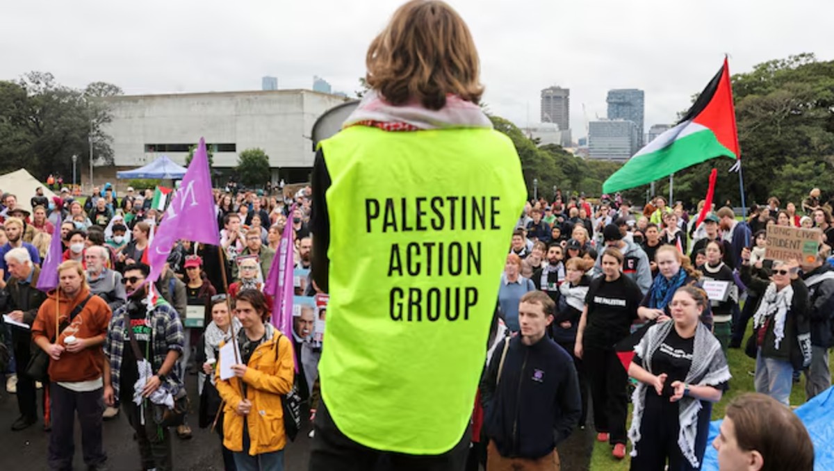 Miembros del Palestine Action Group se reúnen antes de una manifestación en Australia.|  Reuters