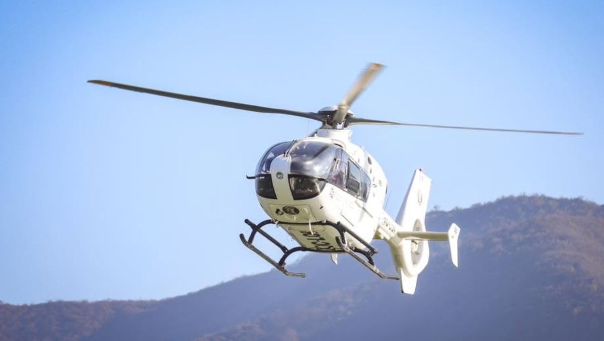 Los elementos de rescate pidieron apoyo del helicóptero para extraer a la mujer. | Especial