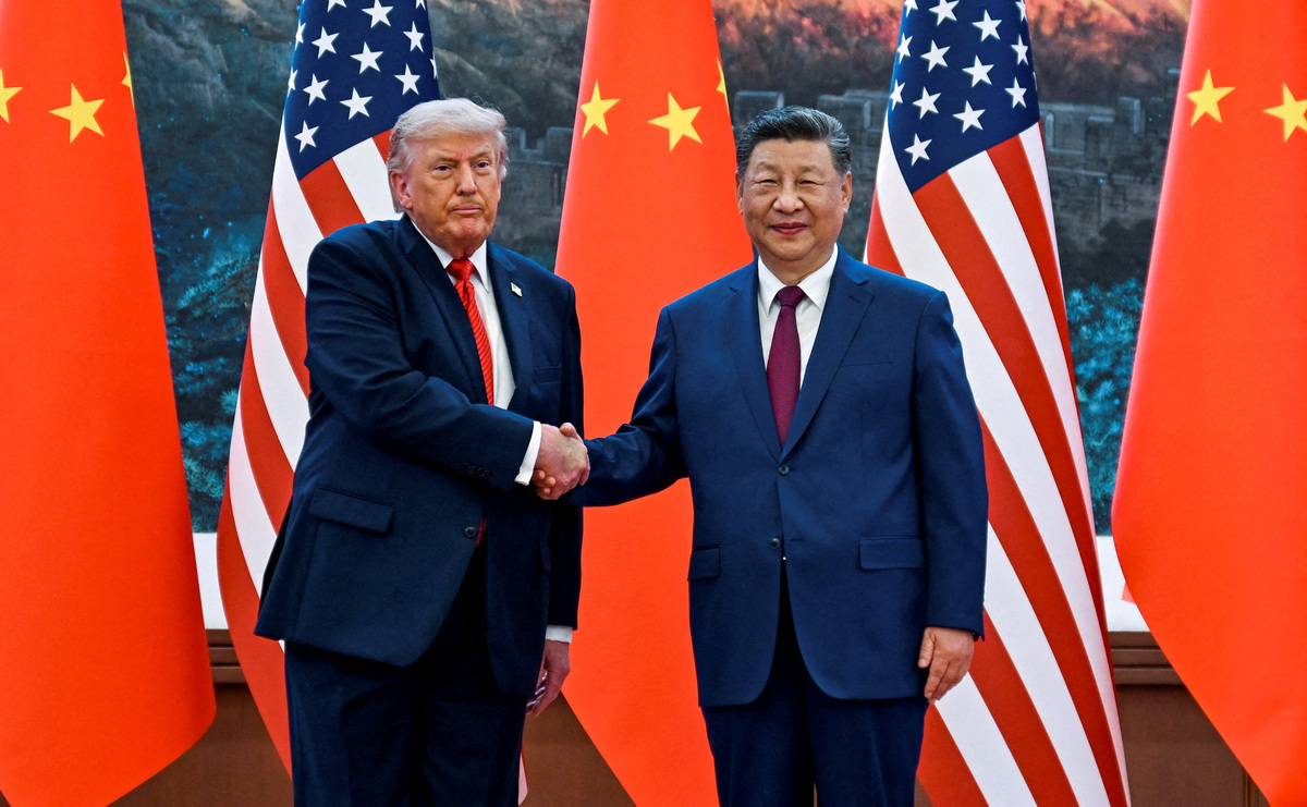 Donald Trump saluda al presidente de la República Popular China, Xi Jinping, el 14 de mayo de 2026. | Reuters